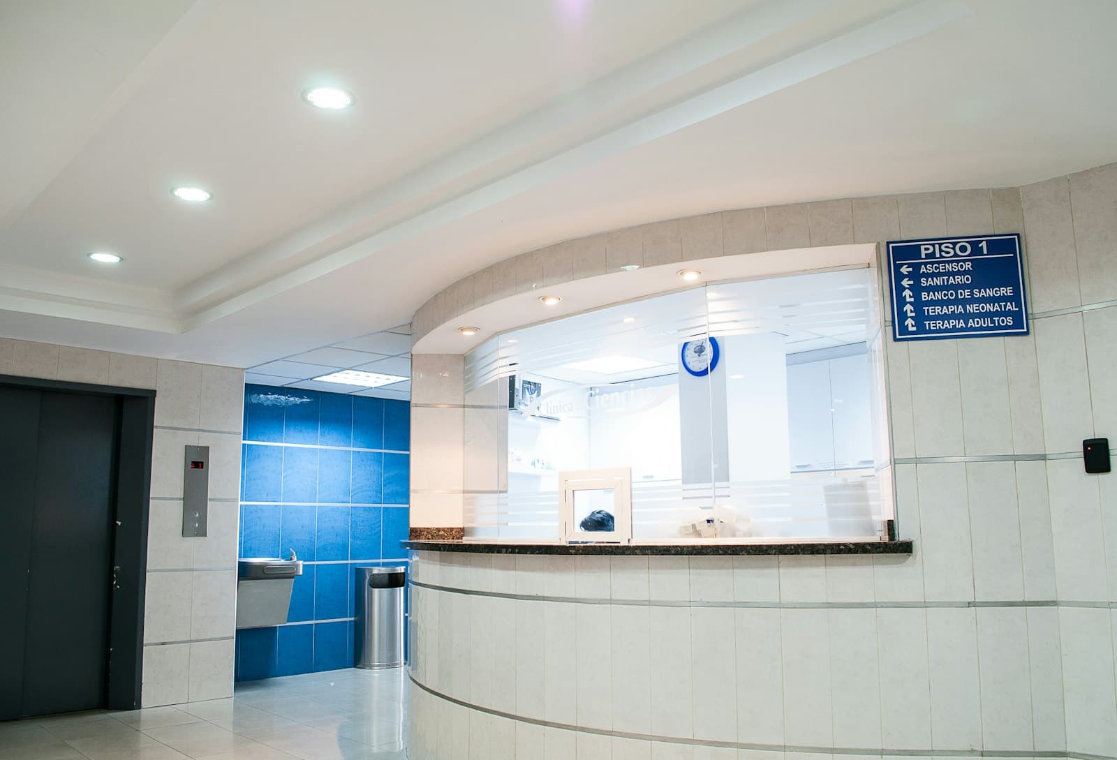 A clean hospital reception and outpatient waiting area