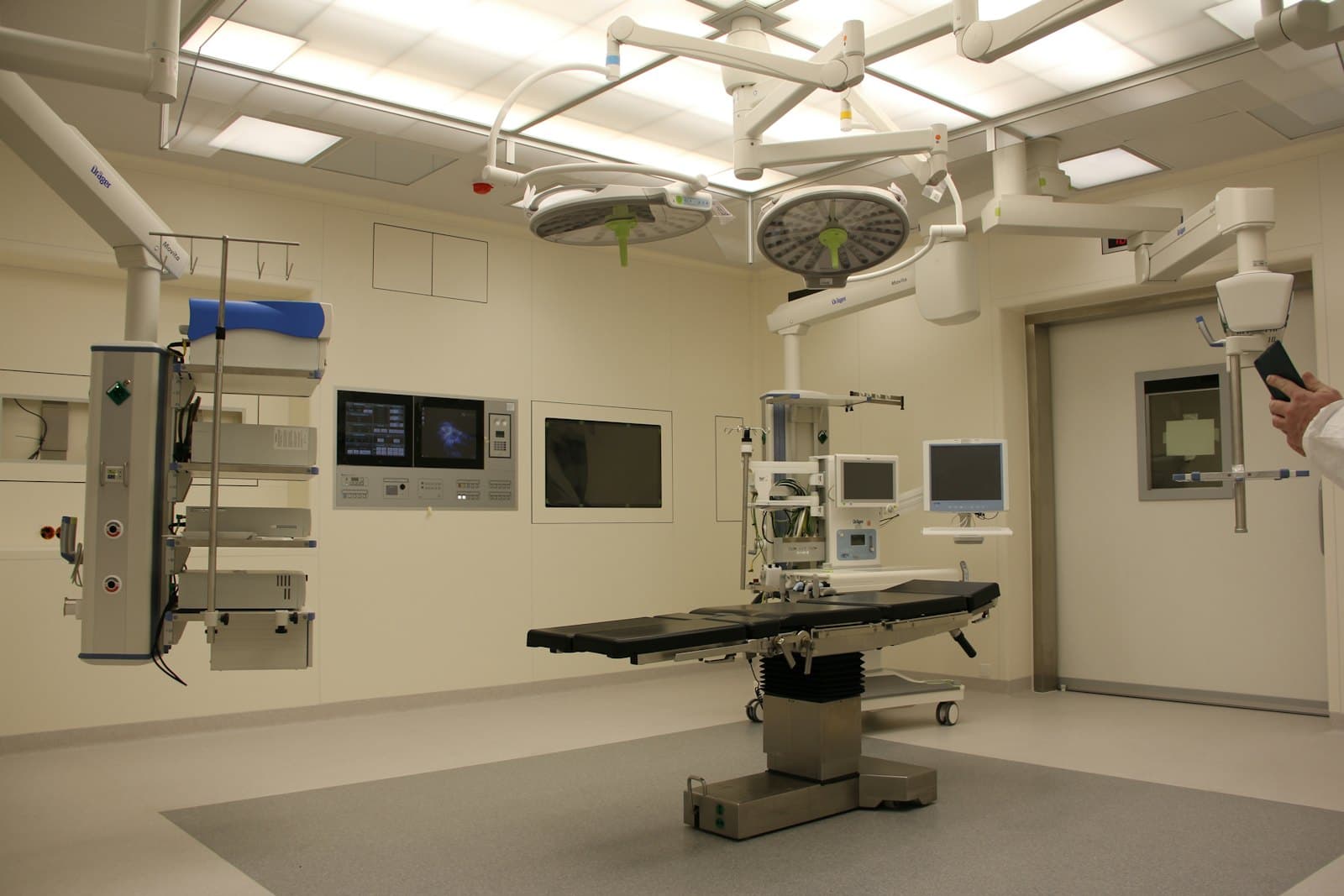 An operation theatre with surgical table and lights